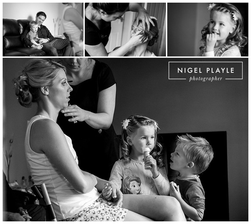 A black and white wedding photograph of a family getting ready for a wedding.