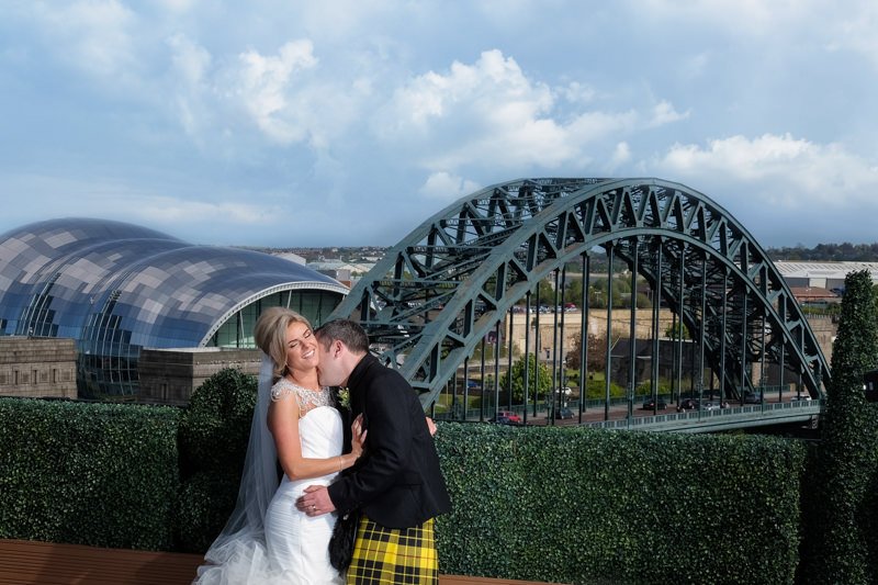 couple in front of tyne bridge