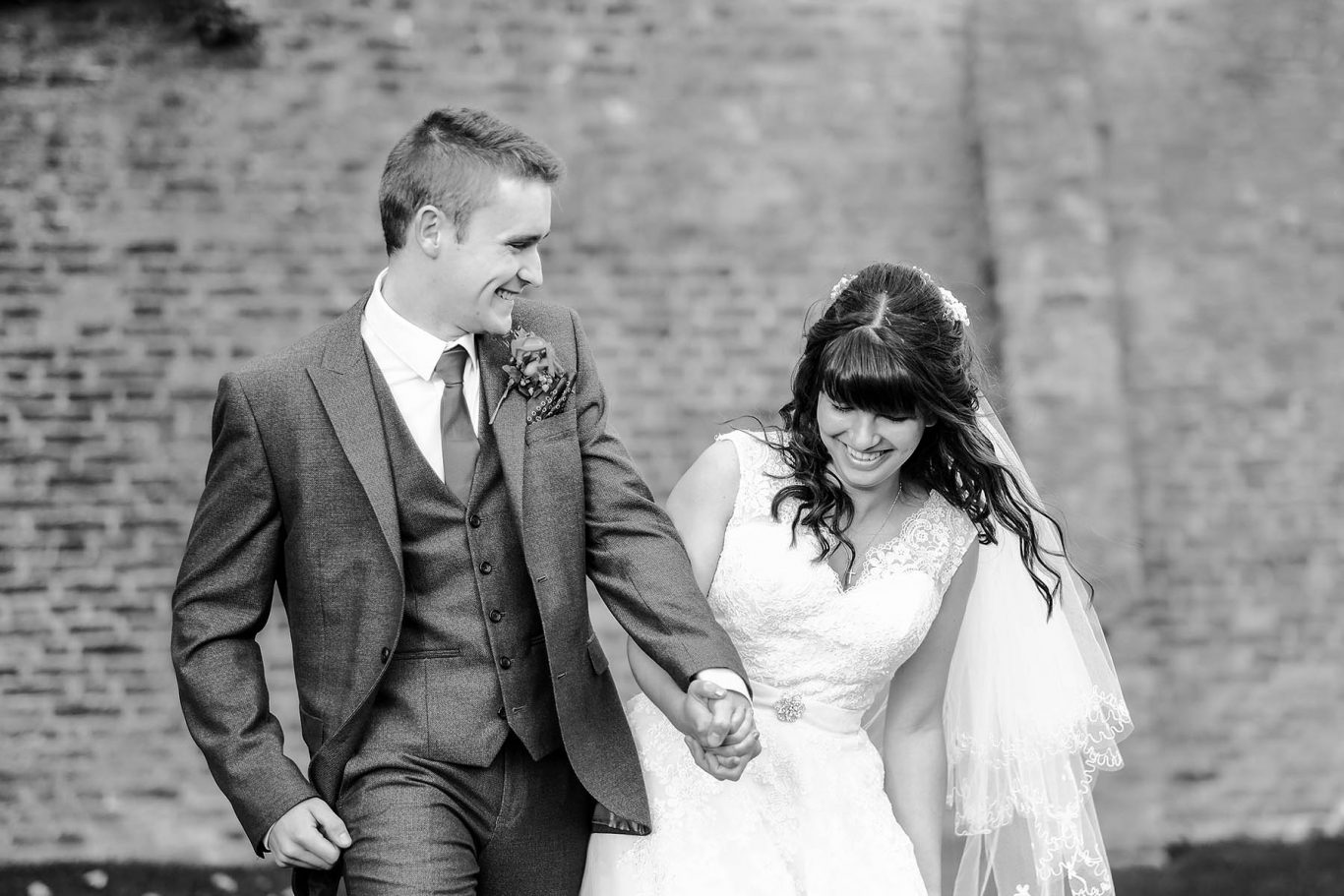 bride and groom smiling