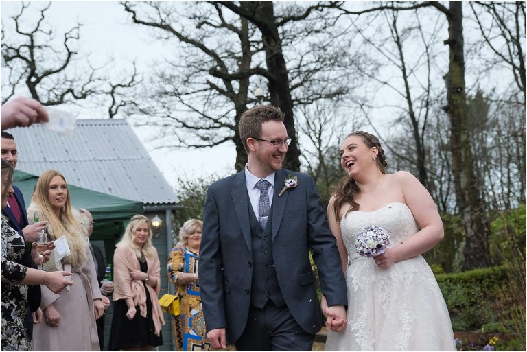 smiling bride and groom