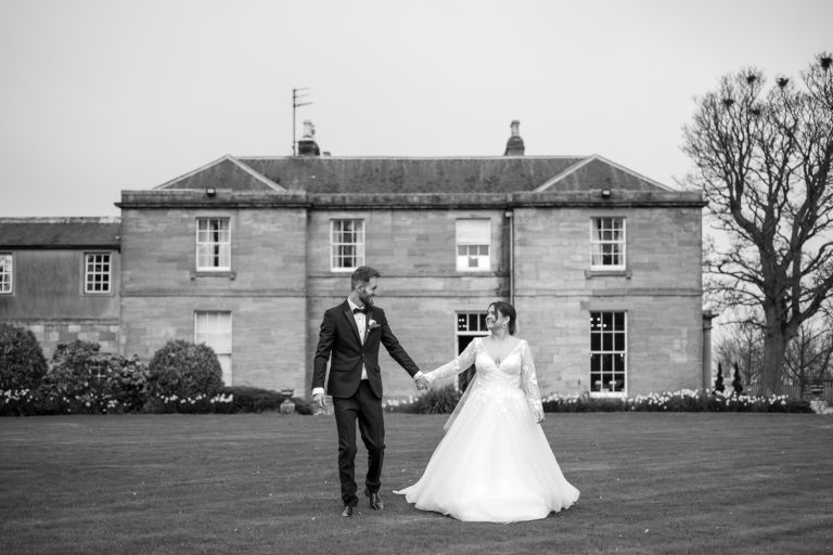 bride and groom walking at marshall meadows