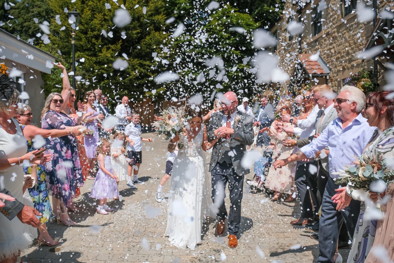 couple under confetti